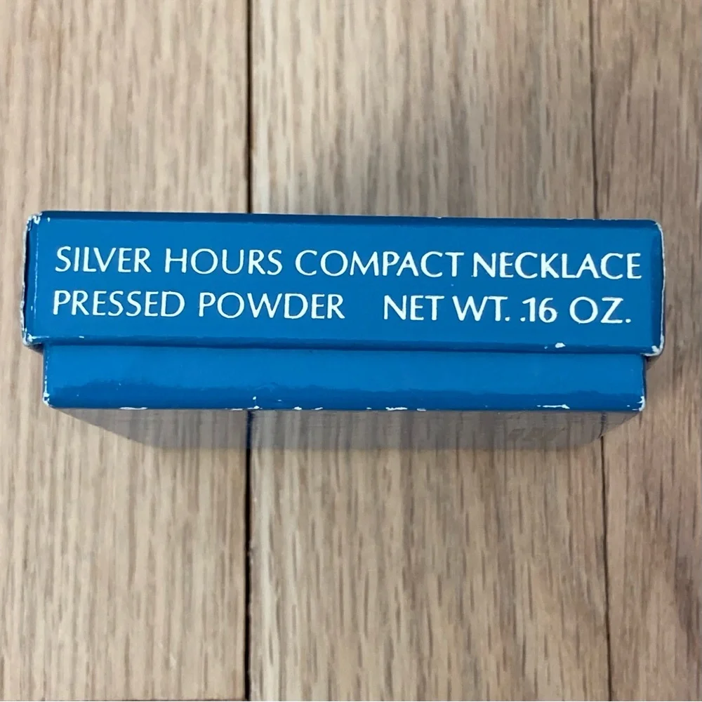 Estee Lauder pocket watch